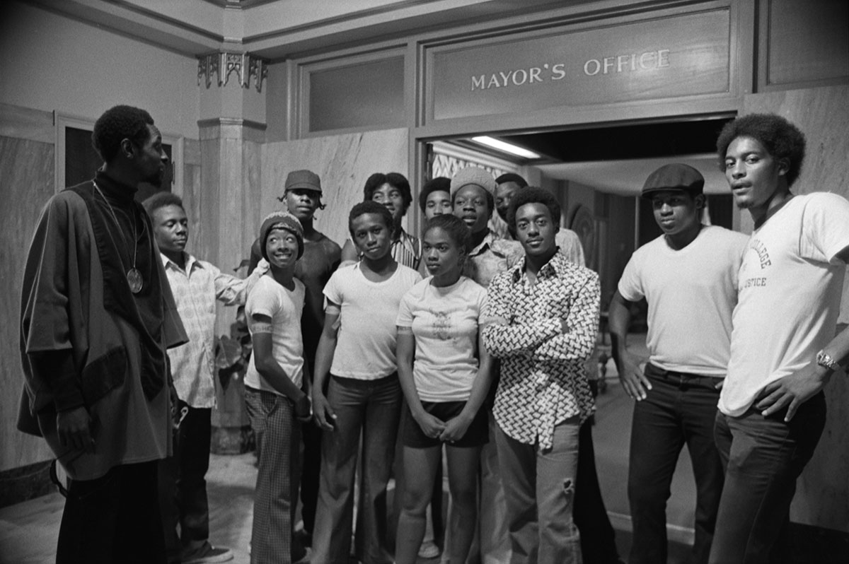 Gene Ferguson and members of an Emmaus House youth group visit the Atlanta mayor's office.